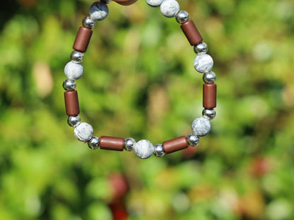 Frosted Picasso Stone & Rosewood Bracelet –Natural Balance and Style. Embrace the beauty of natural textures with this Frosted Picasso Stone