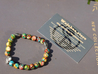 Colorful Sea Sediment Turquoise Bracelet – Tibetan Heart Design. Infuse your style with color, culture, and calm energy