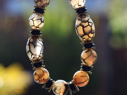 Tibetan Crackle Agate Bracelet – Golden Harmony Collection. Embody strength, wisdom, and grounding energy with this stunning item