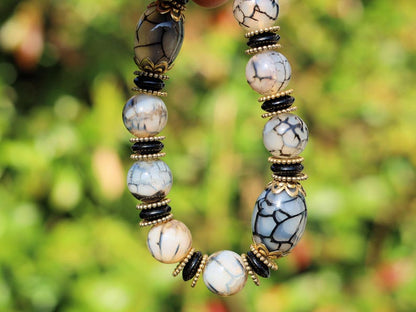 Tibetan Crackle Agate Bracelet – Golden Harmony Collection. Embody strength, wisdom, and grounding energy with this stunning item