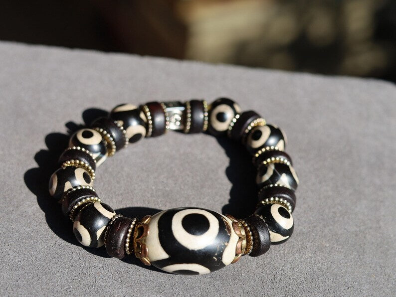 Collector Grade Tibetan 3-Eyed Dzi Bead Bracelet – Antique Old Agate Amulet. Own a piece of ancient spiritual heritage