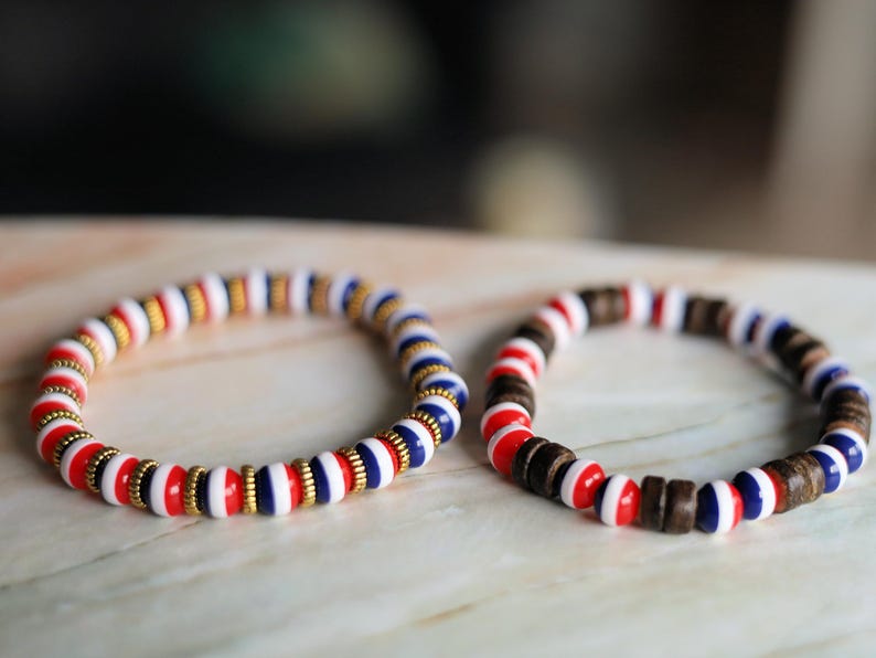 Inspired by Dutch pride and natural elegance, this -themed bracelet set blends patriotic colors with earthy textures and metallic details