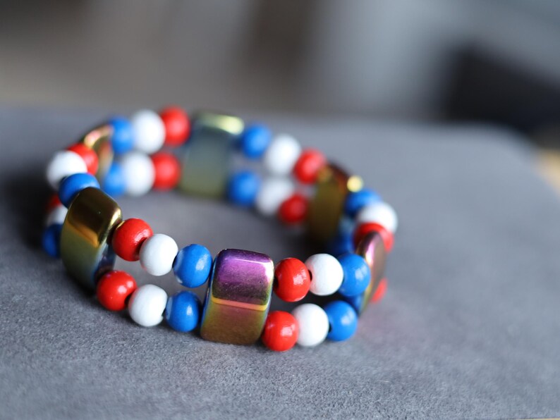 Dutch Double Row Bracelet – Red • White • Blue Wood & Holographic Beads. With striking holographic beads for a modern, eye-catching twist
