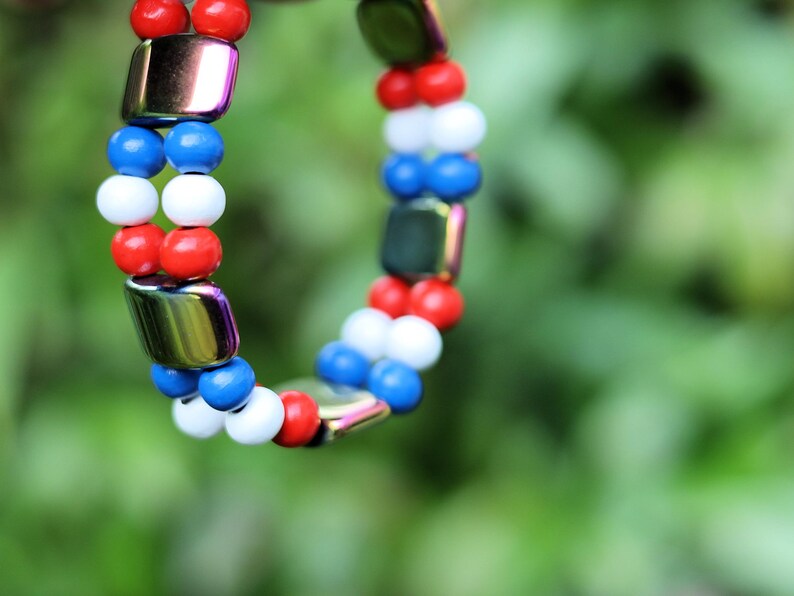 Dutch Double Row Bracelet – Red • White • Blue Wood & Holographic Beads. With striking holographic beads for a modern, eye-catching twist