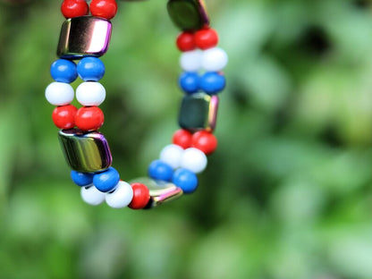Dutch Double Row Bracelet – Red • White • Blue Wood & Holographic Beads. With striking holographic beads for a modern, eye-catching twist