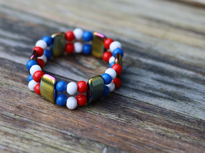 Dutch Double Row Bracelet – Red • White • Blue Wood & Holographic Beads. With striking holographic beads for a modern, eye-catching twist