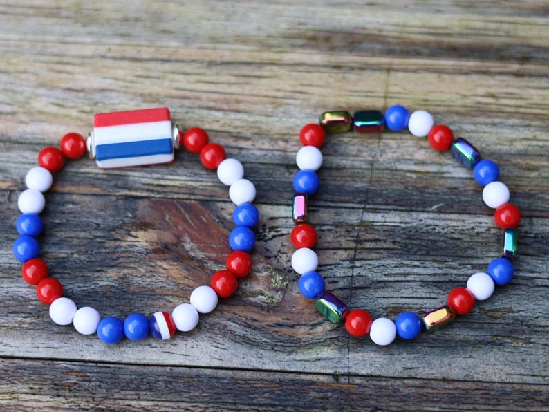 Celebrate national pride with this stylish Dutch-inspired bracelet set, designed in the iconic red, white, and blue colors of the Dutch flag