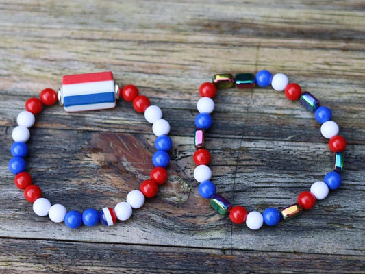 Celebrate national pride with this stylish Dutch-inspired bracelet set, designed in the iconic red, white, and blue colors of the Dutch flag