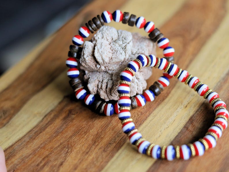 Inspired by Dutch pride and natural elegance, this -themed bracelet set blends patriotic colors with earthy textures and metallic details